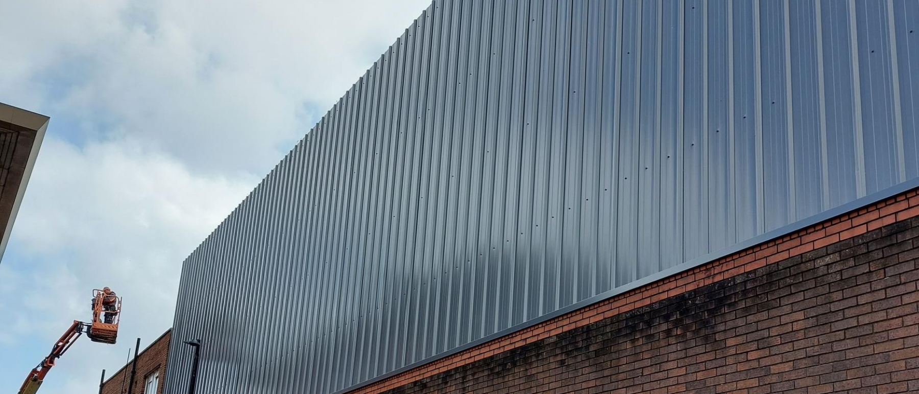 Steel cladding added to an existing building