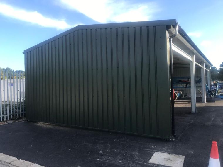 Side of steel shed constructed for water treatment company